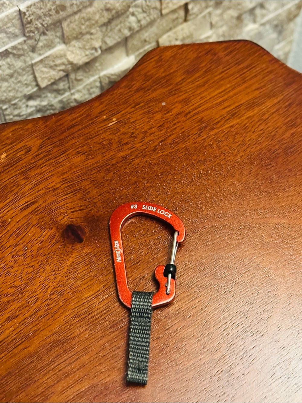 Red Slide-Lock Carabiner Key Clip with Gray Webbing Strap